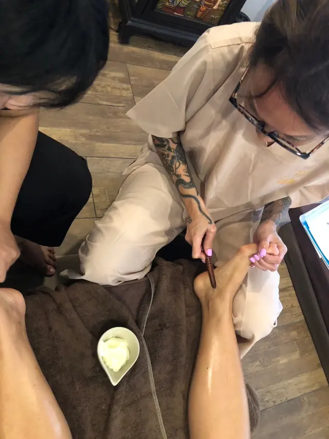 Oiled foot massage