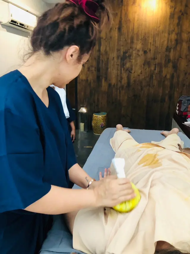 Herbal compress bodywork