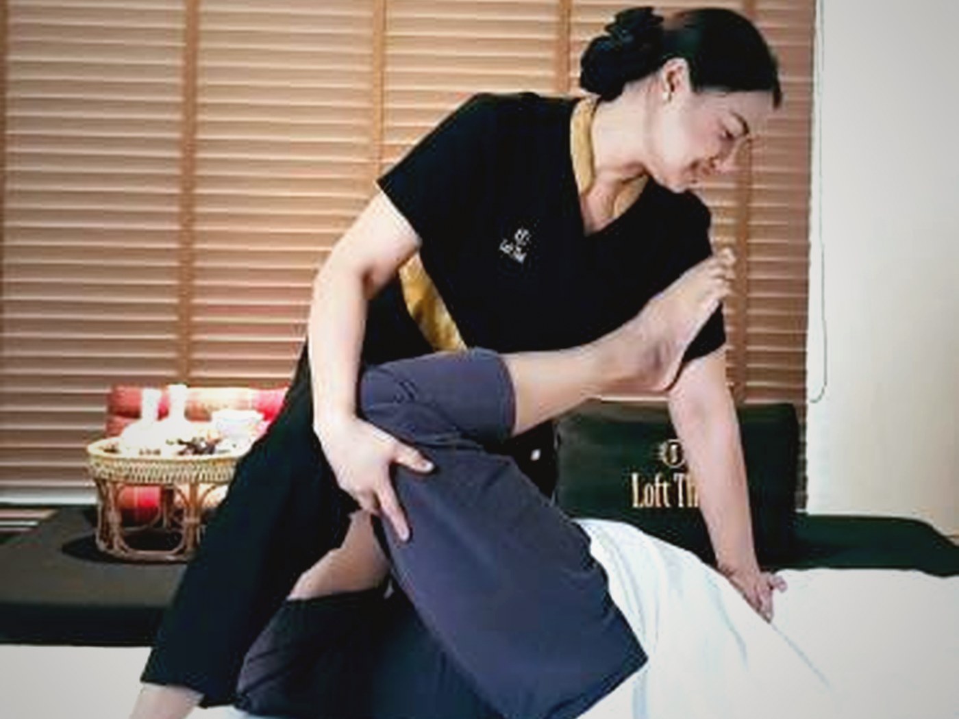 Thai massage passive yoga style position