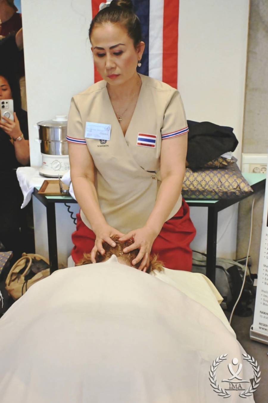 Thai Herbal Compress Head Therapy demonstration by Varinraya Ketngam